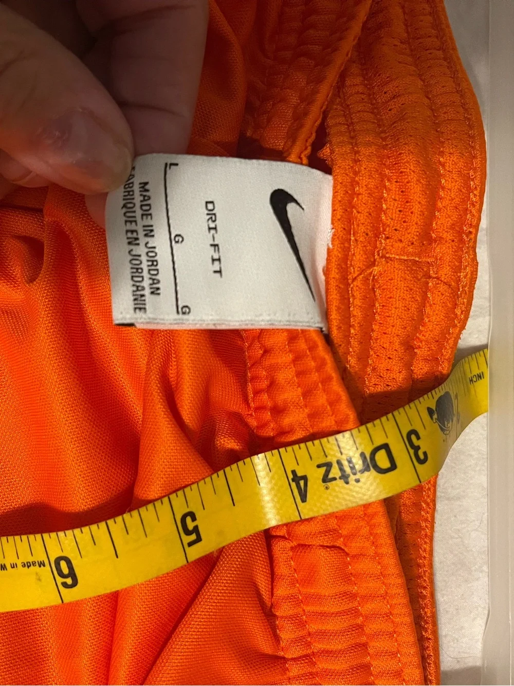 Nike Girl's Bright Orange Athletic Shorts with White Swoosh